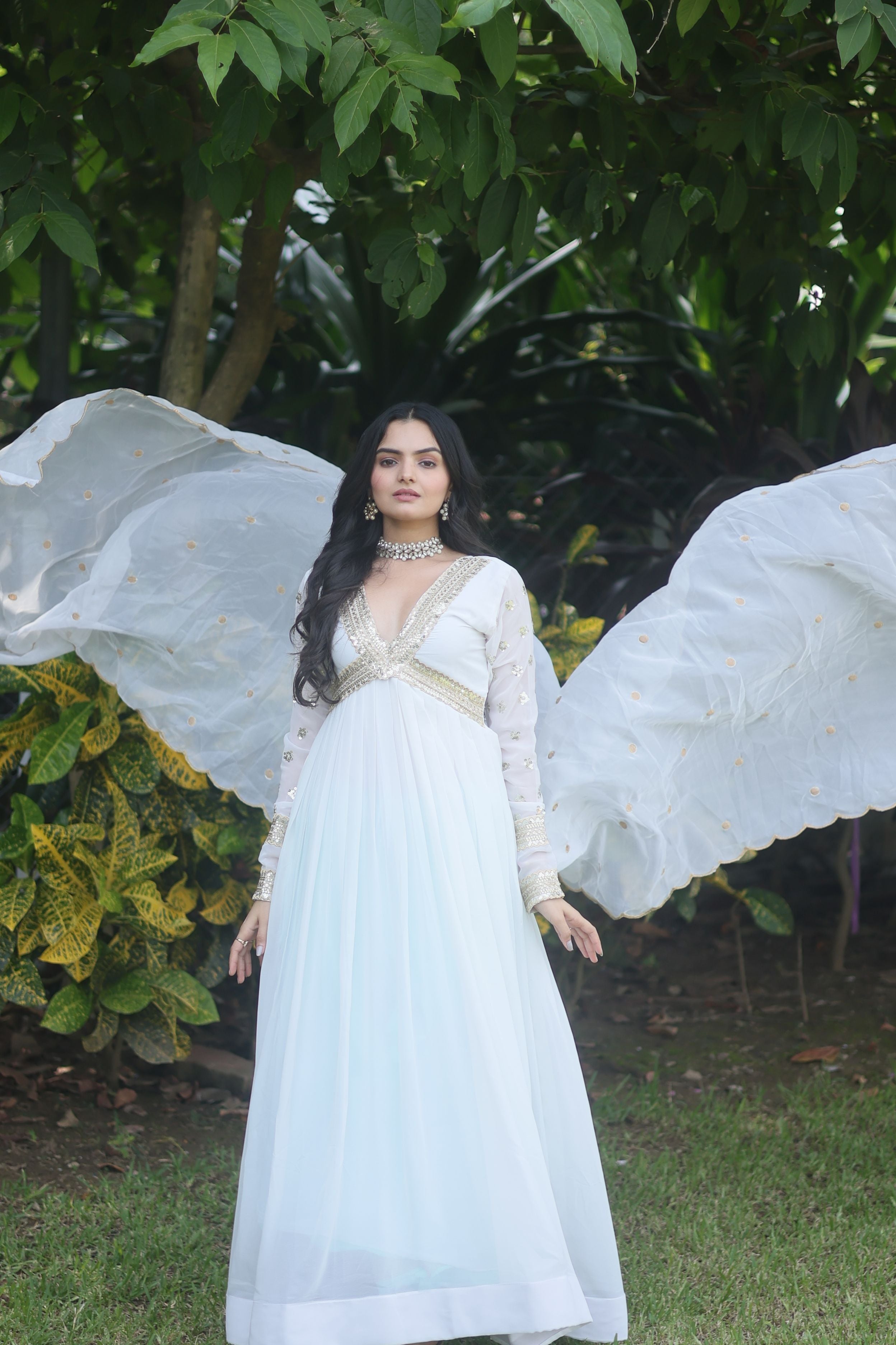 Aastha White Faux Blooming Russian Silk with Gown Embroidered Zari Sequins-work