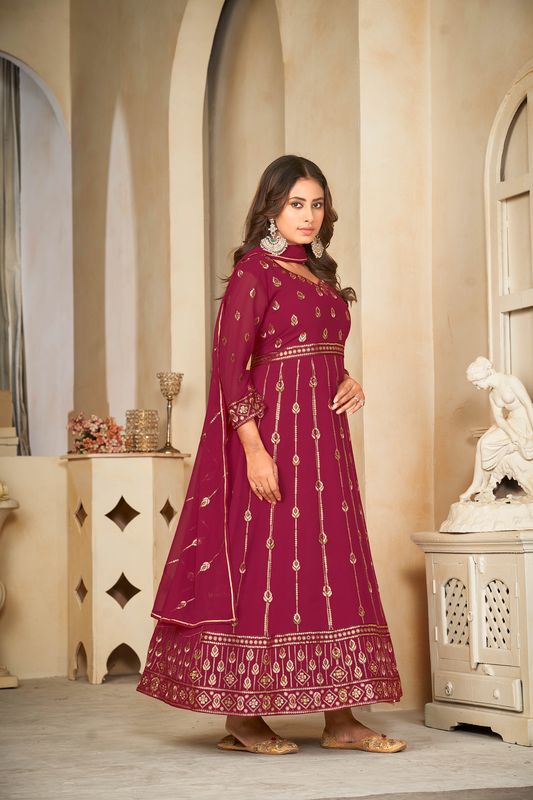 Aastha Dark pink with Net top fabric Santoon Net Bottom fabric