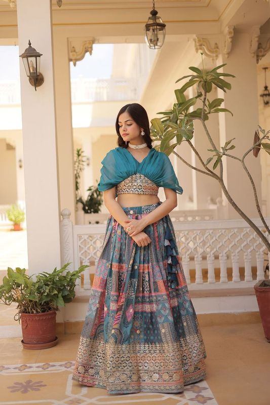 Aastha fashion teal Lehenga Chinnon koti febric embroidery