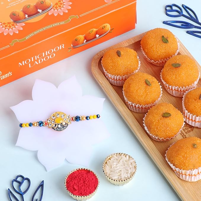 Raksha Bandhan Celebrations Yellow And Blue Beaded Kundan Rakhi With 250g Motichoor Laddoo - Rakhi for Brother, Bhai, Cousins & Raksha Bandhan Gift