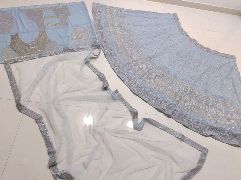 Aastha fashion off grey Lehenga Choli with faux georgette blouse fabric