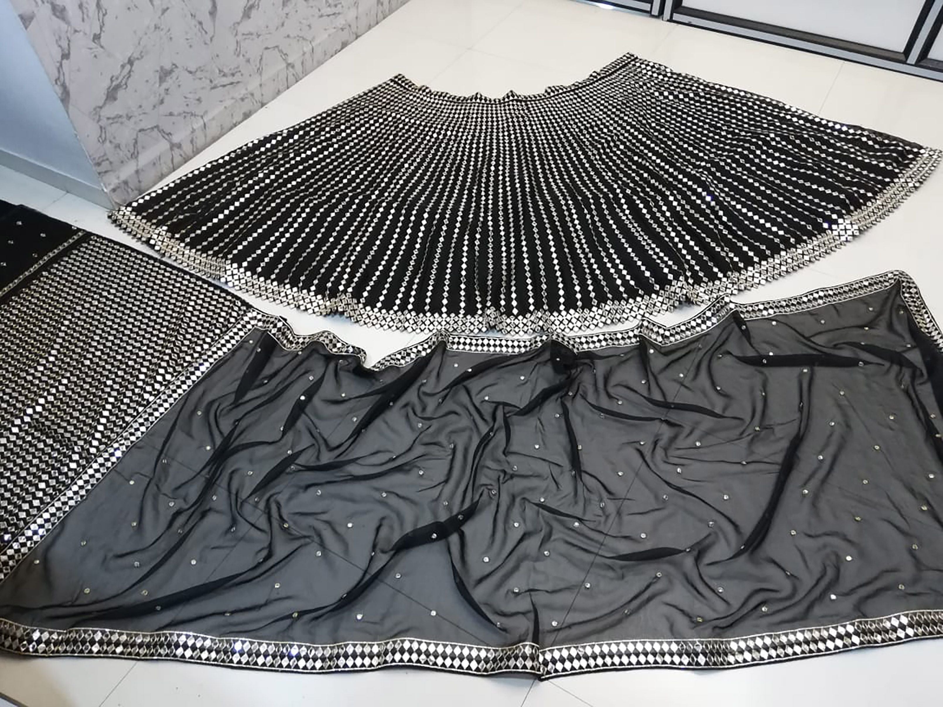 Aastha fashion off black Lehenga Choli with organza silk blouse fabric