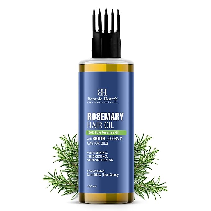 Bottle of Botanic Hearth Rosemary Hair Oil with rosemary leaves on a white background
