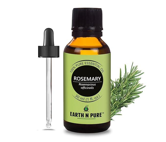 Bottle of Earth N Pure Rosemary essential oil with a dropper and rosemary sprig on a white background