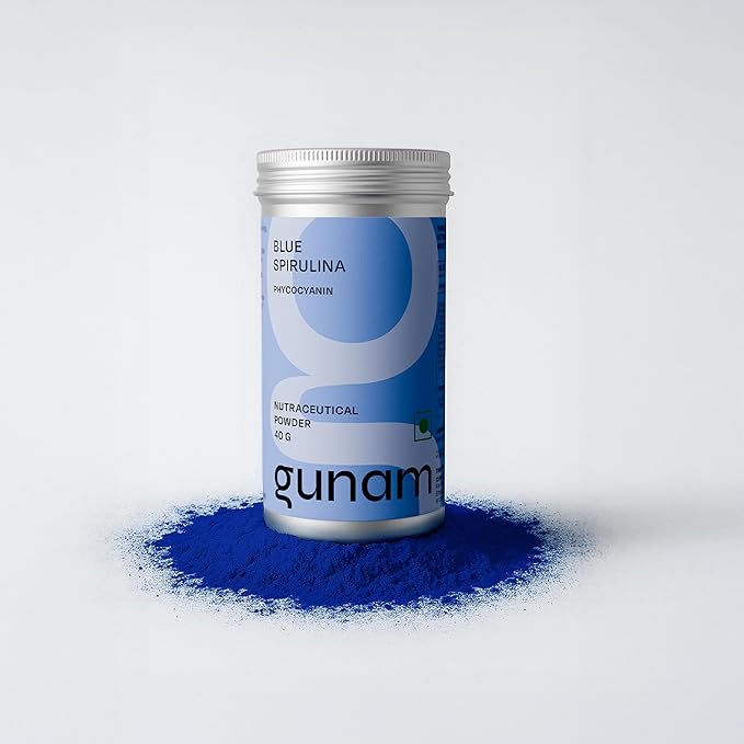 An individual bottle of blue spirulina powder