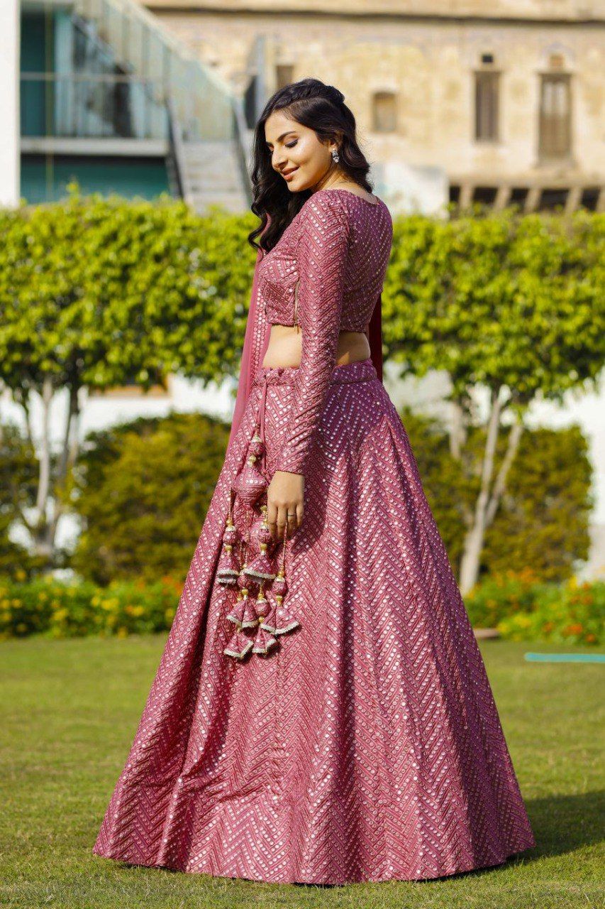 Aastha fashion off magenta Lehenga Choli with faux georgette blouse fabric