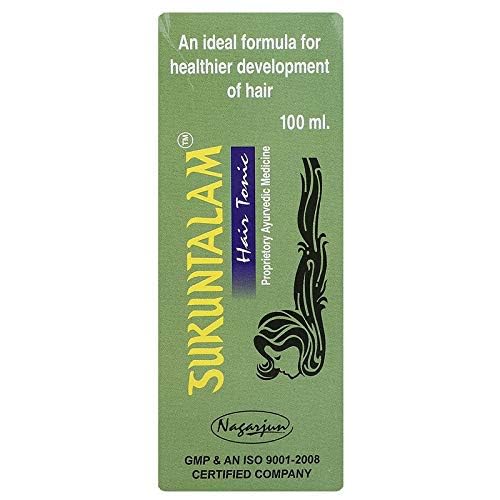 Green package of Surkuntalam hair tonic with text on a white background