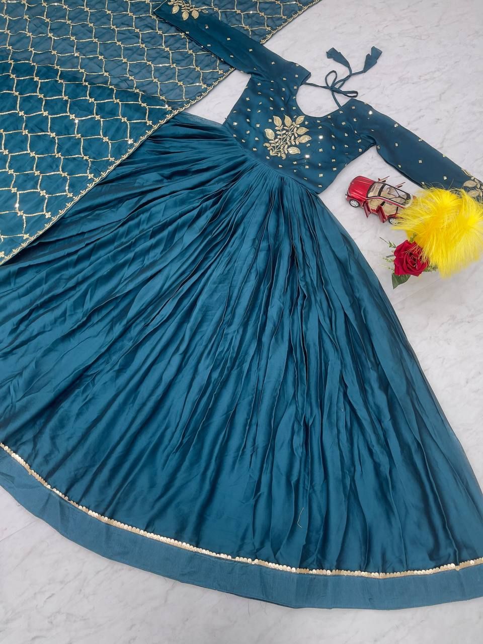 Aastha Turquoise pure Rangoli with Gown Embroidery Work