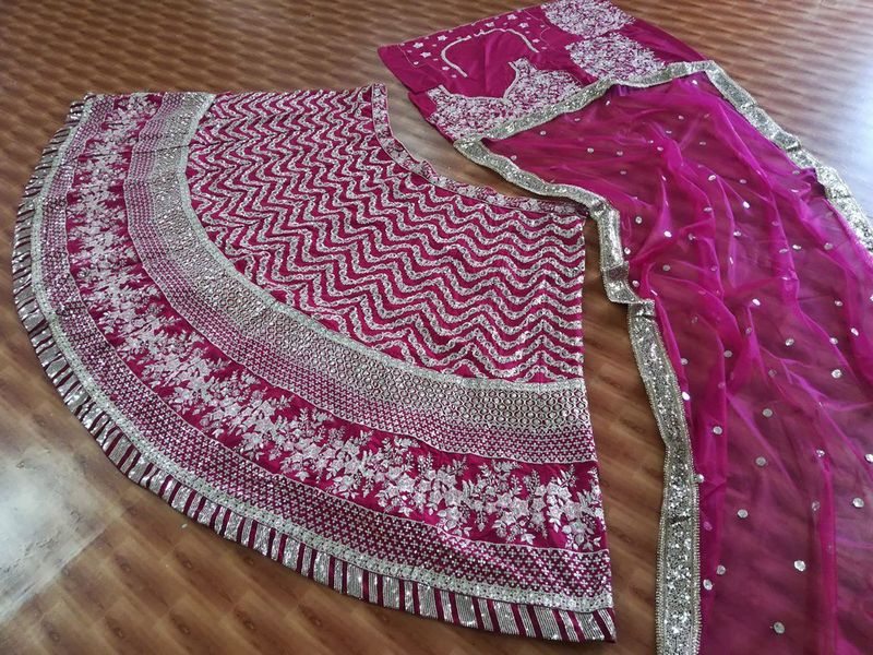 Aastha fashion off magenta Lehenga Choli with silk fabric blouse fabric