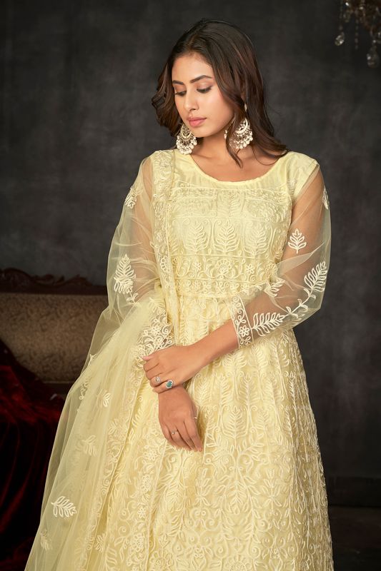 Aastha light yellow with Net top fabric Santoon Net Bottom fabric