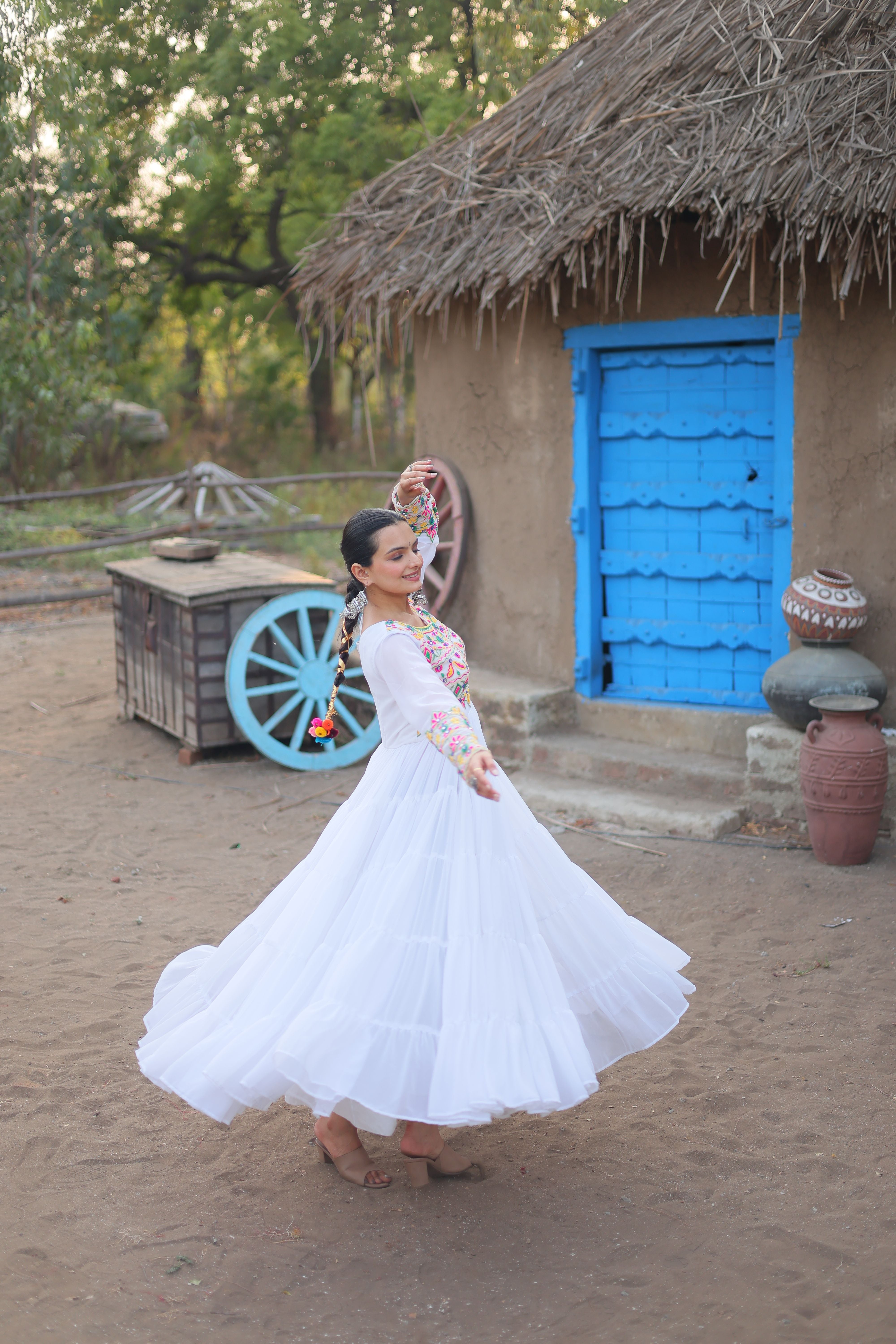 Aastha White with Gown Blooming Faux Georgette Kutchi Gamthi Work