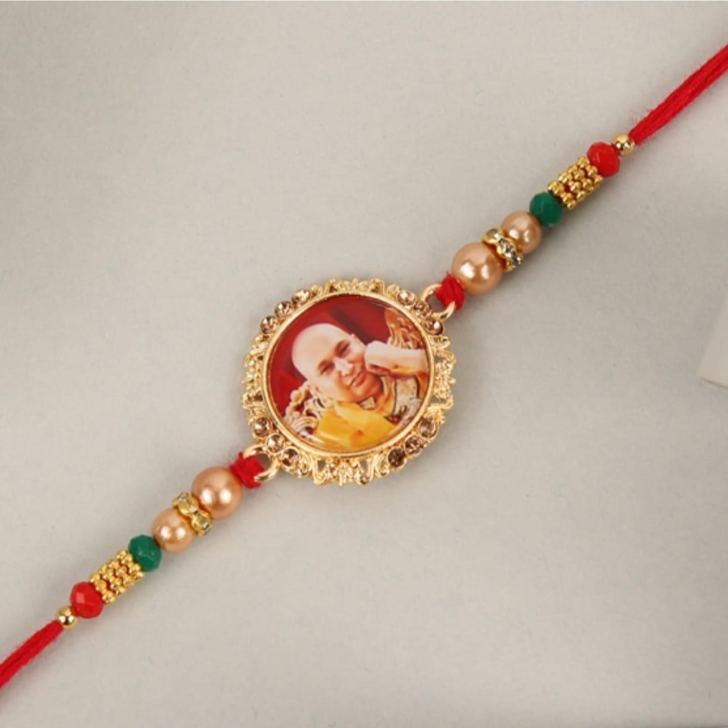 Guruji Design Rakhi (Red & Yellow)