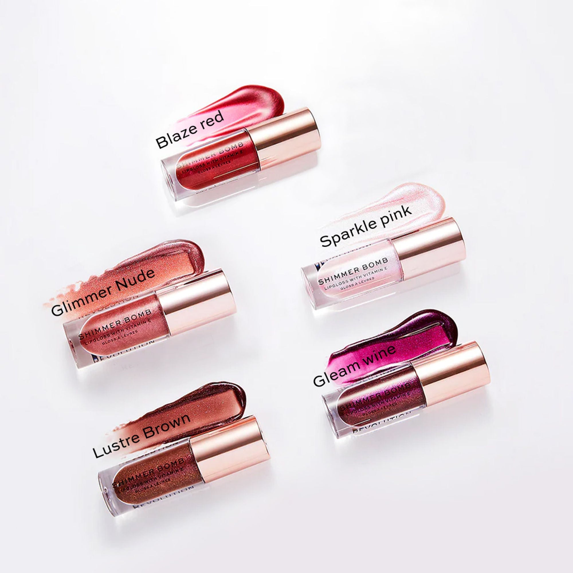 Makeup Revolution Shimmer Bomb Lip Gloss Infused With Vitamin E For Extra Nourishment - Glimmer Nude
