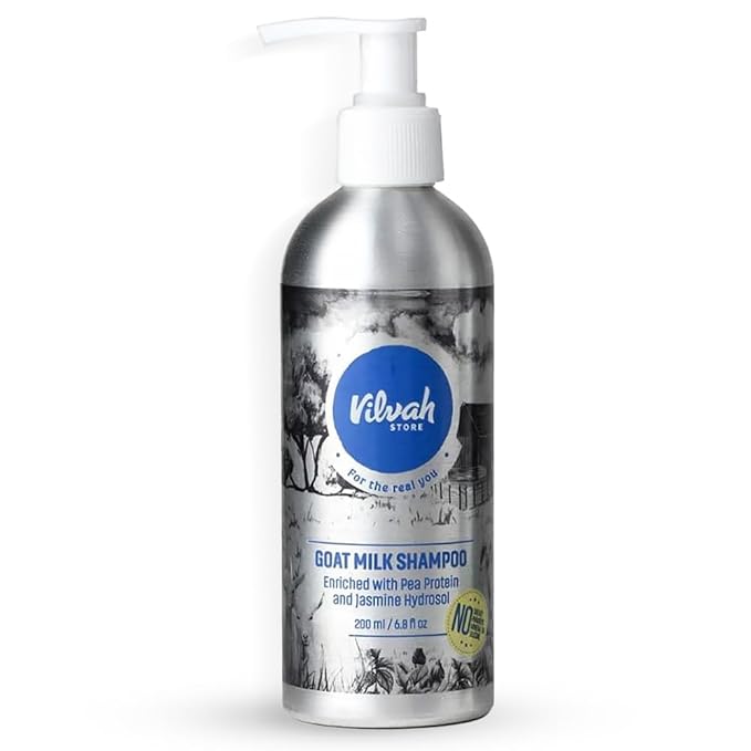 Vilvah goat milk shampoo bottle on a white background