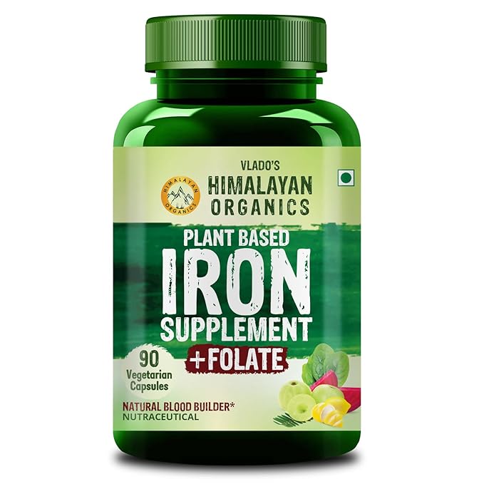 Green bottle of Vladho's Himalayan Organics plant-based iron supplement on a white background
