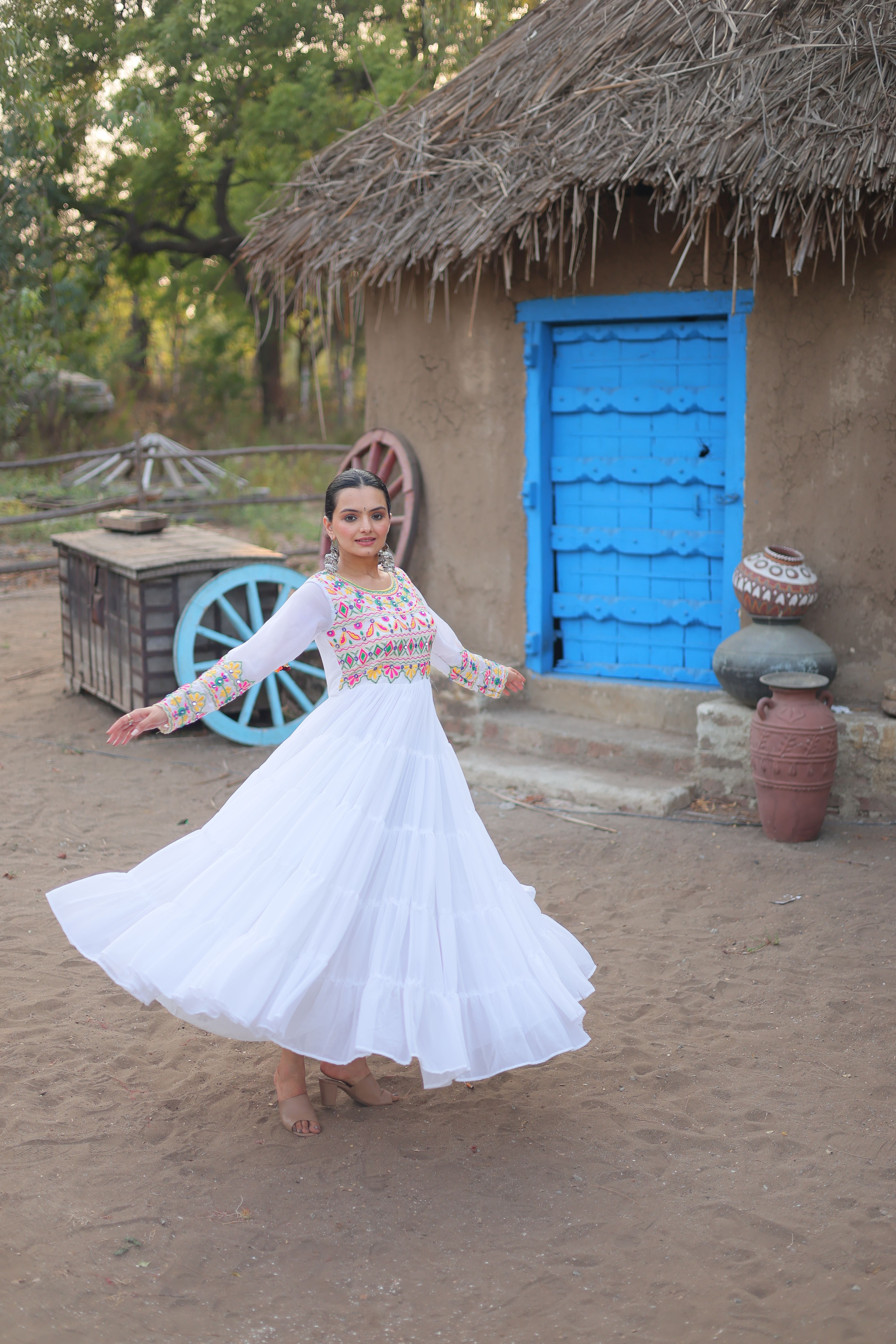 Aastha White with Gown Blooming Faux Georgette Kutchi Gamthi Work