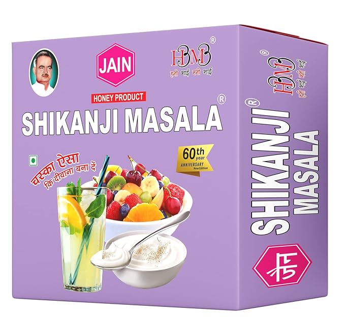Box of Shikanji Masala with images of a glass of fruit juice and a bowl of rice, on a purple background.