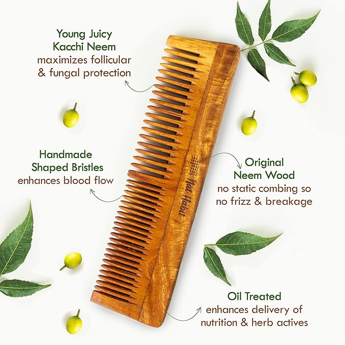 Wooden comb with neem oil treatment and leaves on a white background