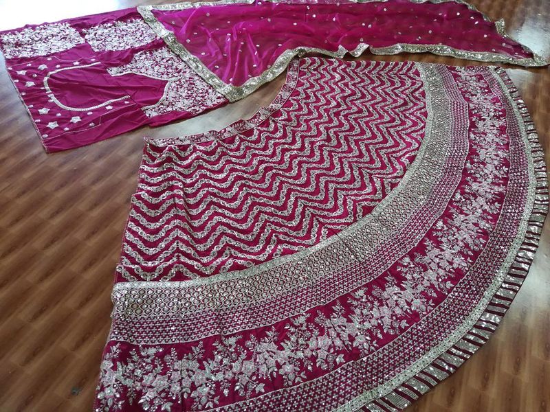 Aastha fashion off magenta Lehenga Choli with silk fabric blouse fabric
