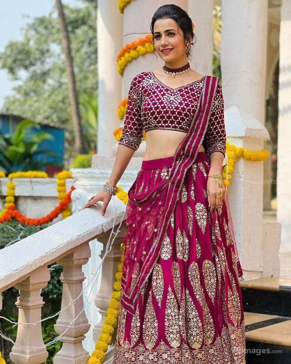 Aastha fashion off magenta Lehenga Choli with faux georgette blouse fabric