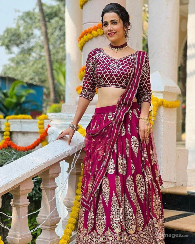 Aastha fashion off magenta Lehenga Choli with faux georgette blouse fabric