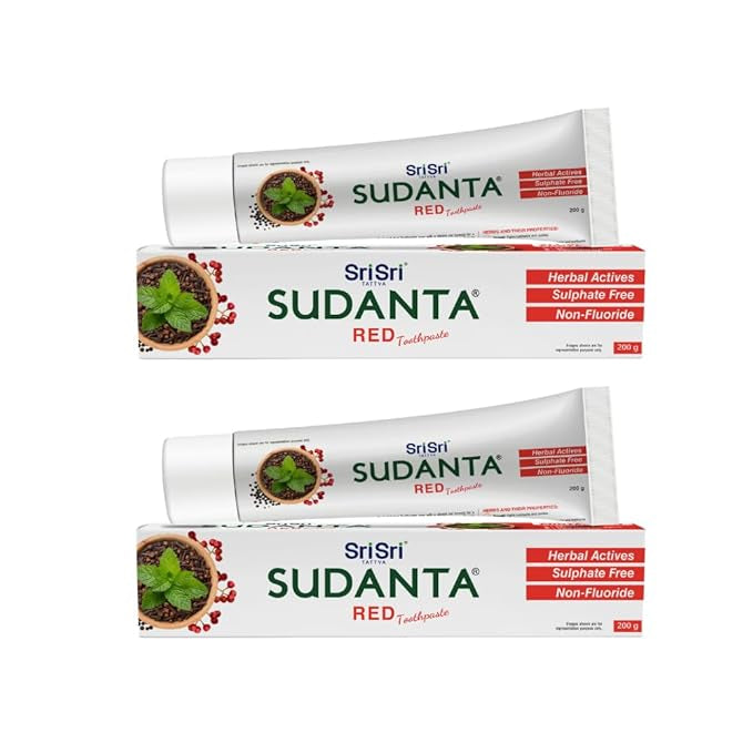 Three tubes of Sri Sri Sudanta Red Toothpaste on a white background