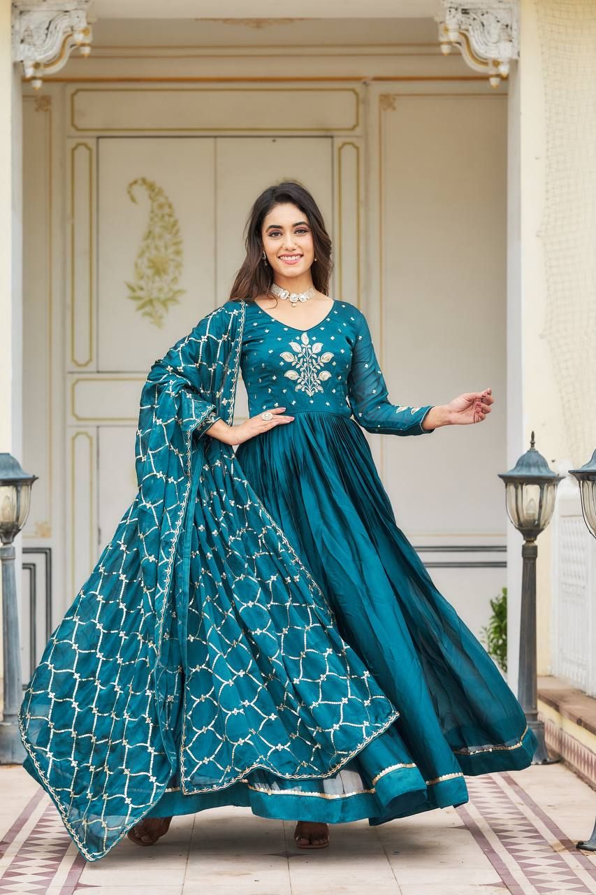Aastha Turquoise pure Rangoli with Gown Embroidery Work