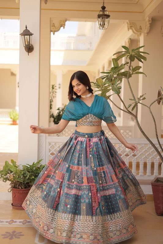 Aastha fashion teal Lehenga Chinnon koti febric embroidery