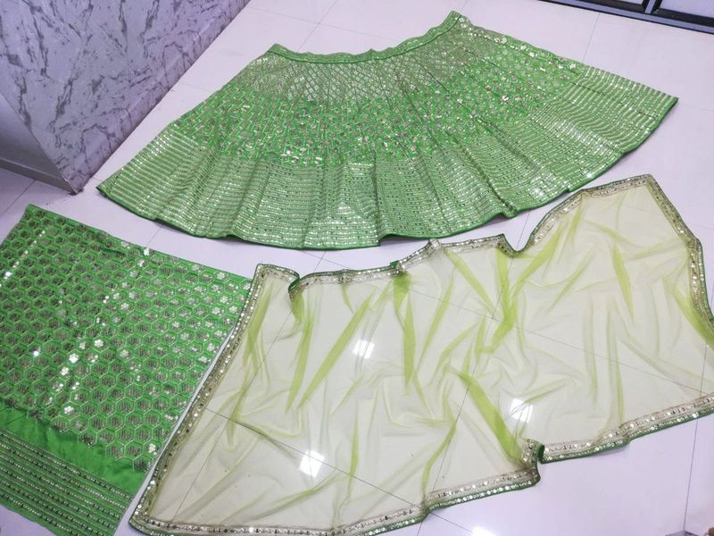 Aastha fashion off green Lehenga Choli with banglori silk blouse fabric