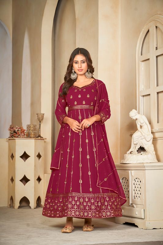 Aastha Dark pink with Net top fabric Santoon Net Bottom fabric