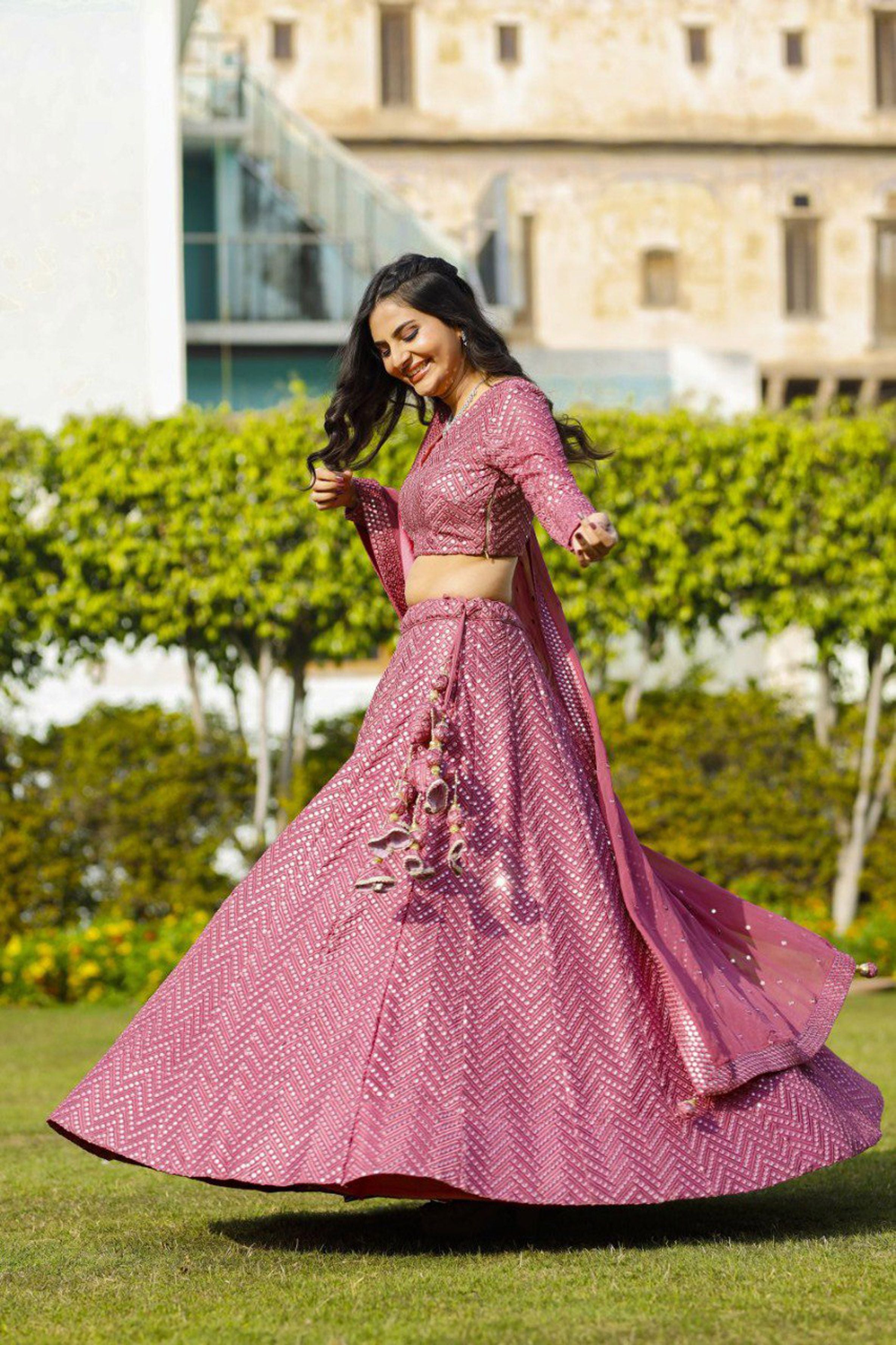 Aastha fashion off magenta Lehenga Choli with faux georgette blouse fabric