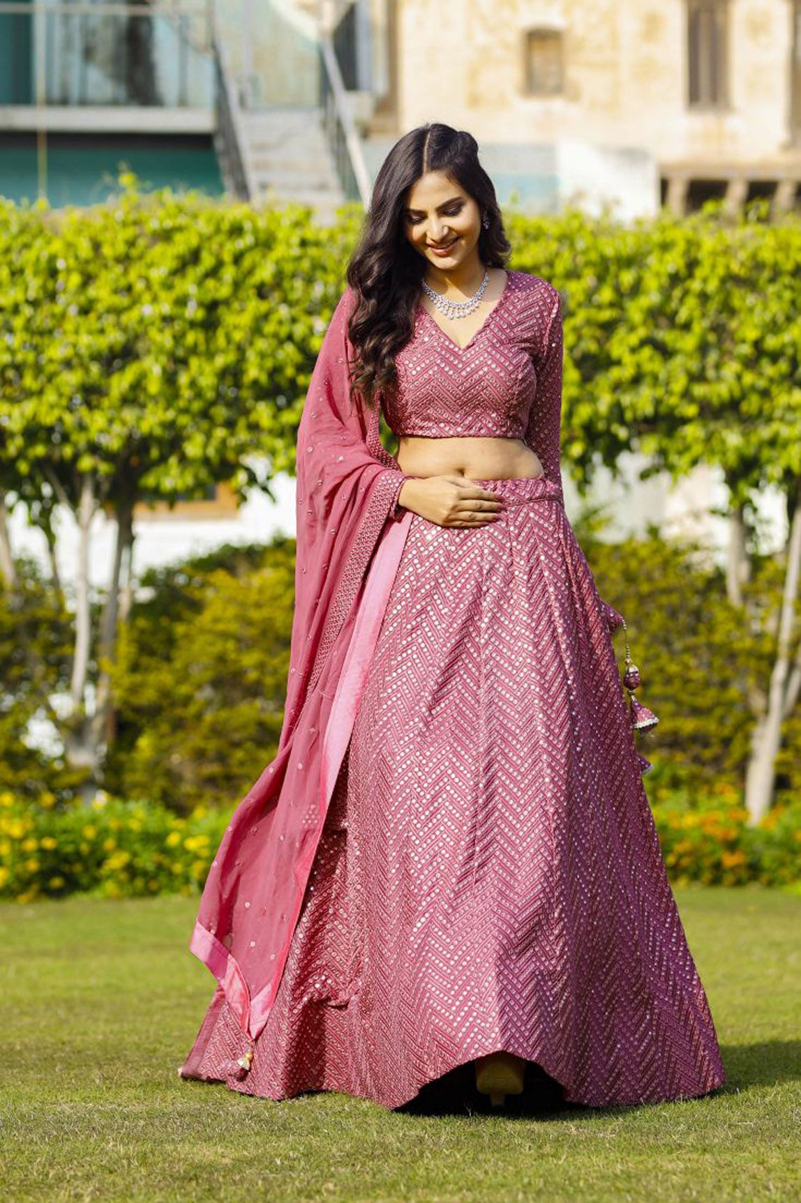 Aastha fashion off magenta Lehenga Choli with faux georgette blouse fabric