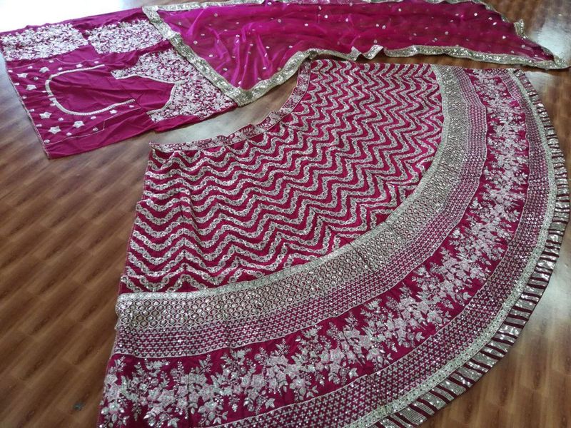 Aastha fashion off wine Lehenga Choli with silk net blouse fabric