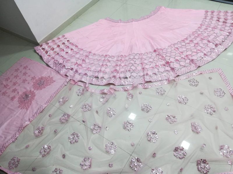 Aastha fashion off pink Lehenga Choli with faux net blouse fabric
